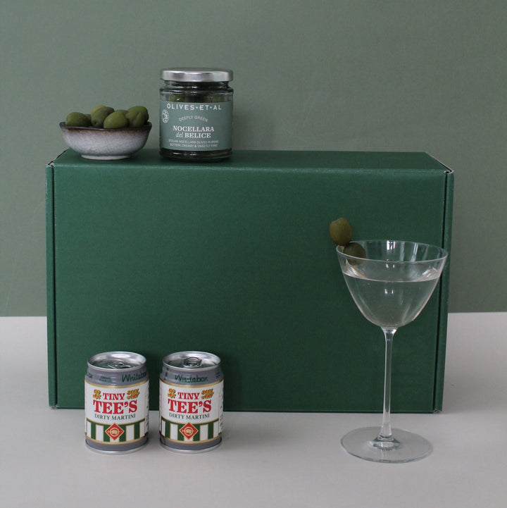 Gift box with dirty martini, martini glass and olives for him