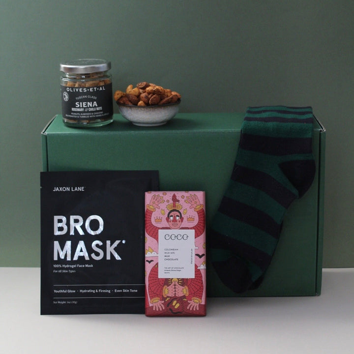 socks, chocolate, nuts and face mask gift box