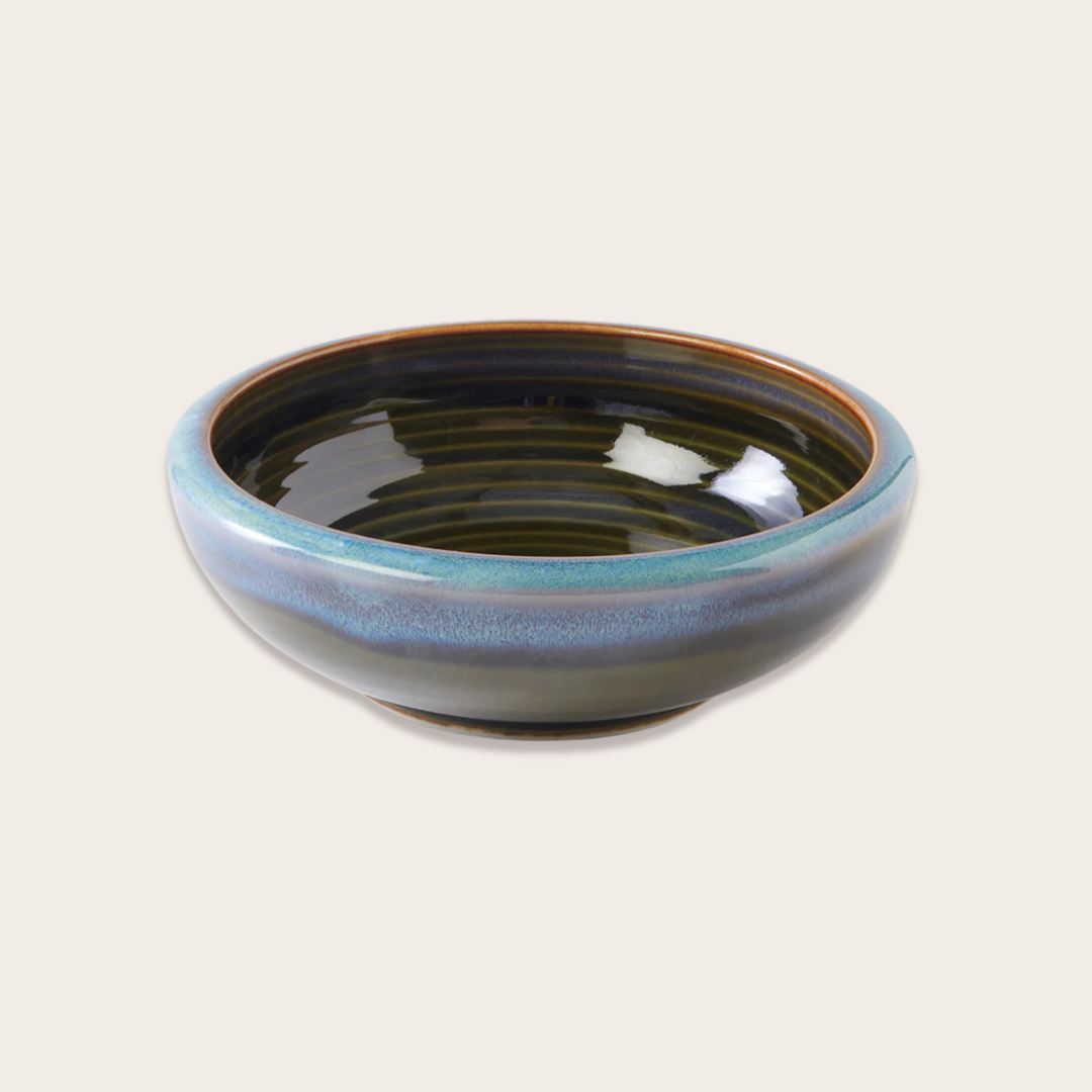 Ceramic bowl with blue and brown glaze