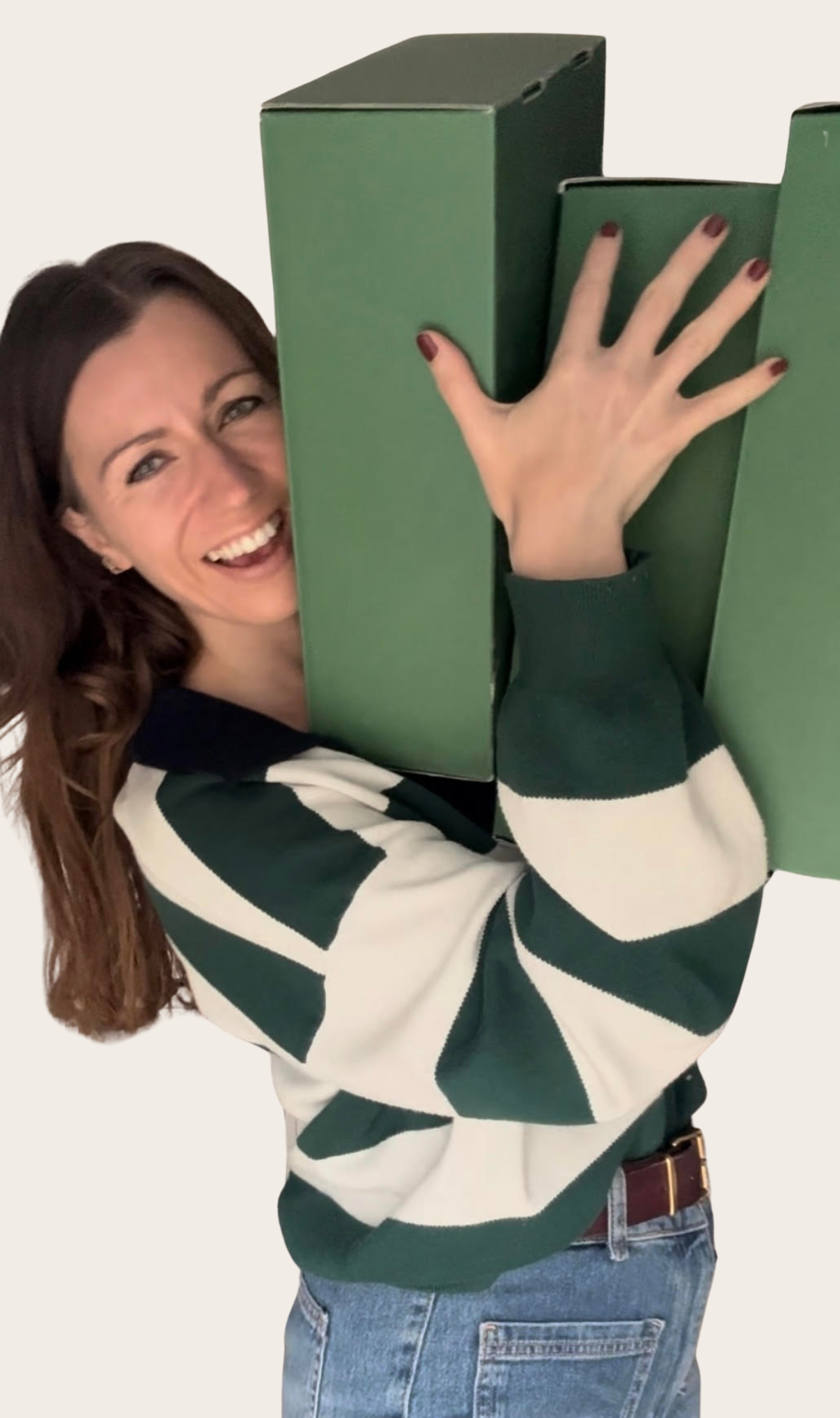 Woman holding green gift boxes for men