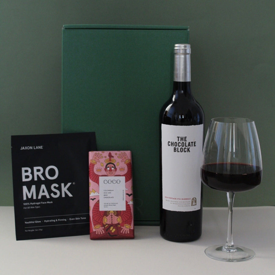 wine with facemask and chocolate gift box