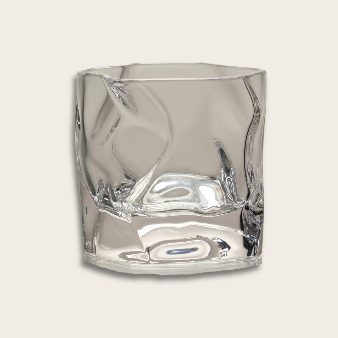 Clear glass tumbler with unique wave design 